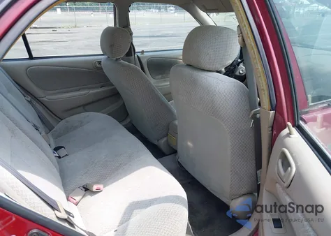 1999 Toyota Corolla Ce из США, поврежденный, VIN 2T1BR12E1XC244432